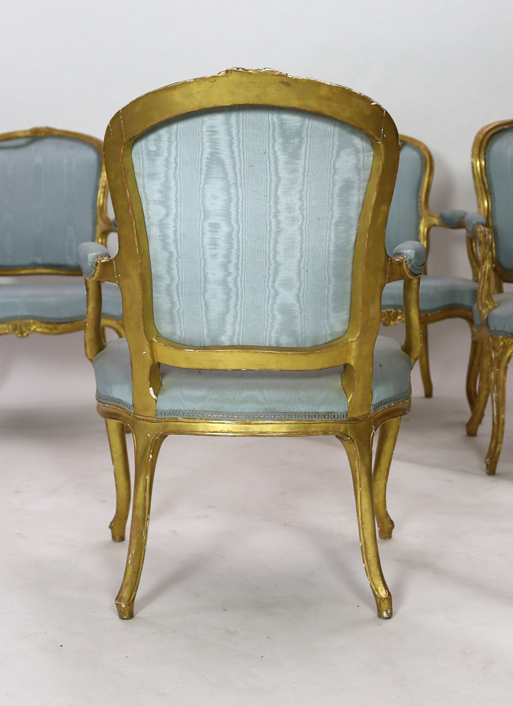 A set of four Louis XVI carved giltwood fauteuils, W.65cm D.62cm H.93cm